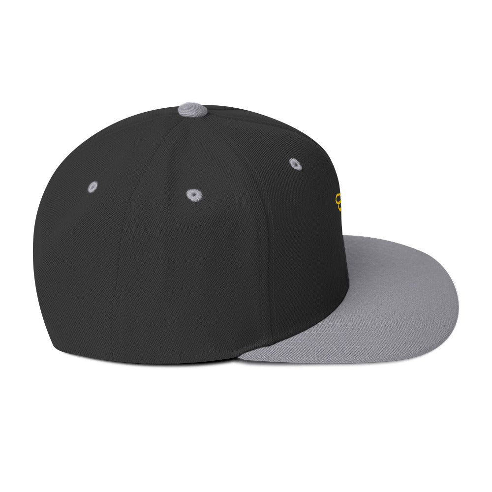 Gorra snapback Ave dorada