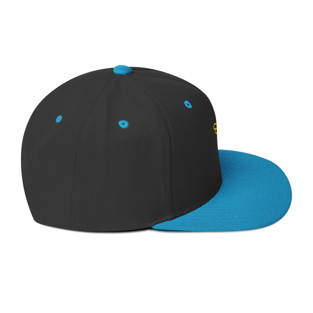 Gorra snapback Ave dorada