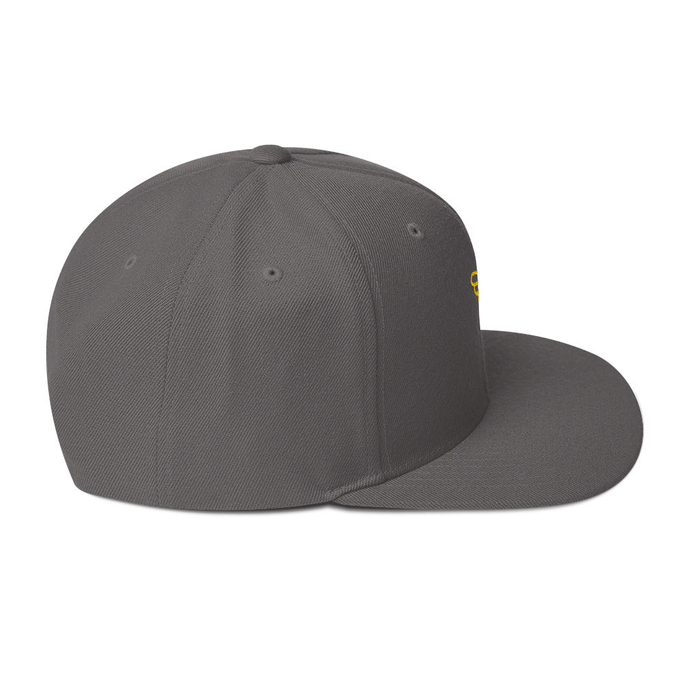 Gorra snapback Ave dorada