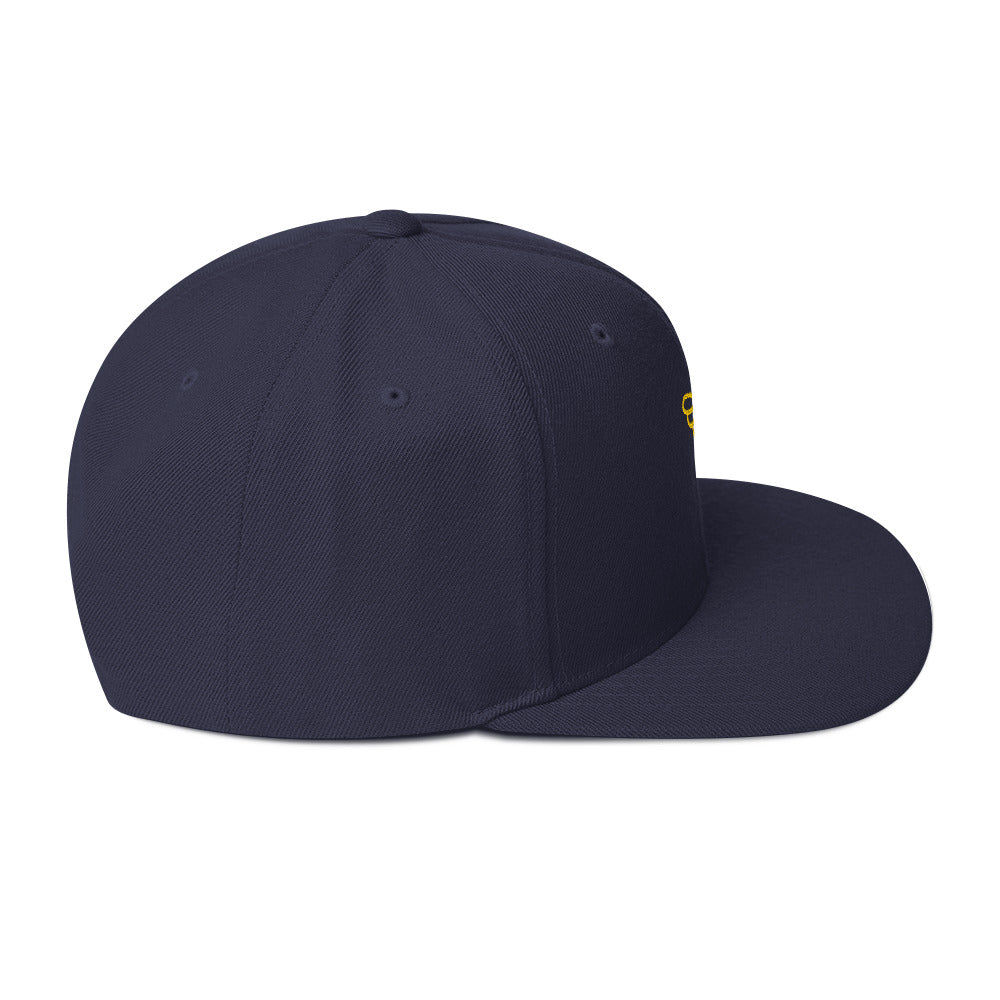 Gorra snapback Ave dorada