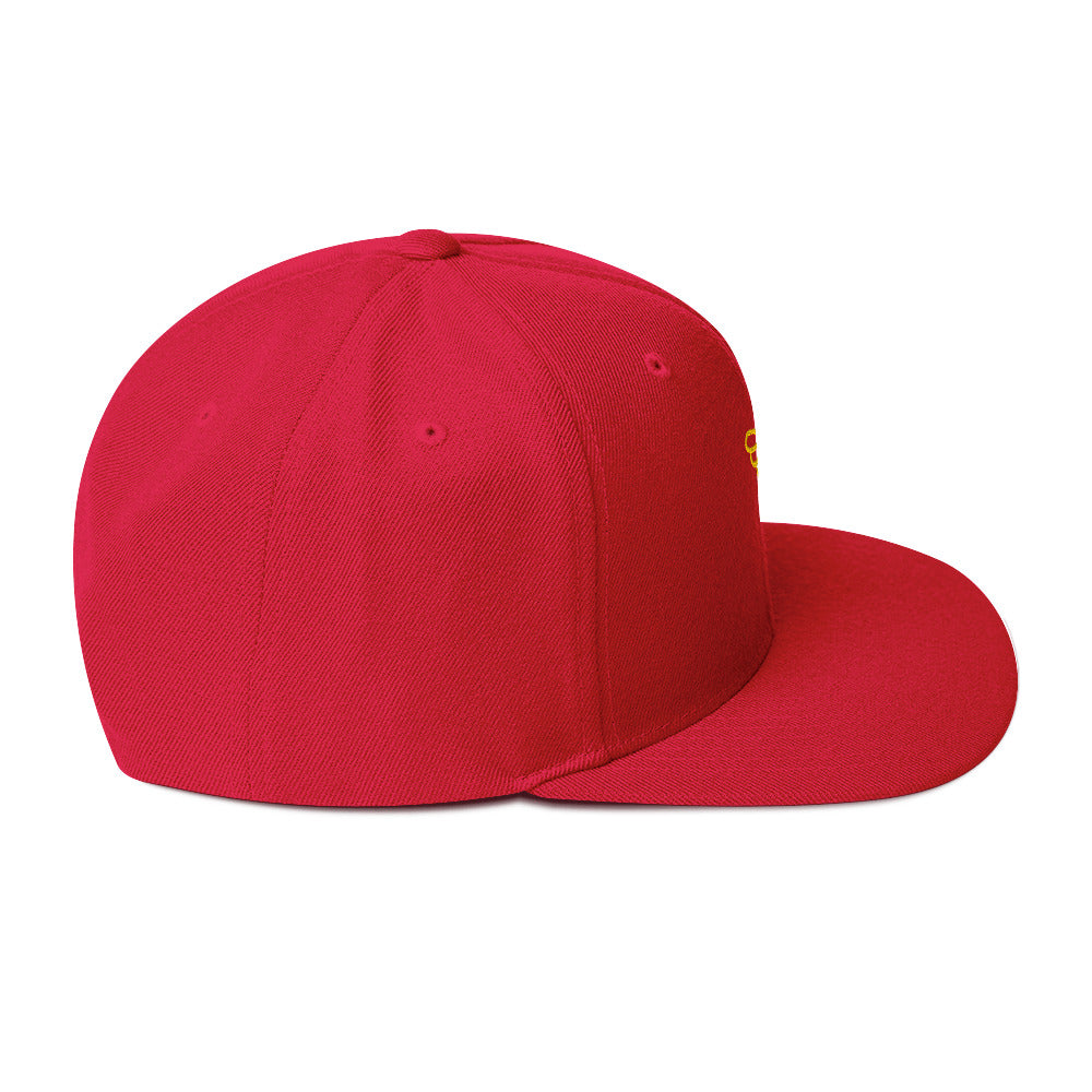 Gorra snapback Ave dorada