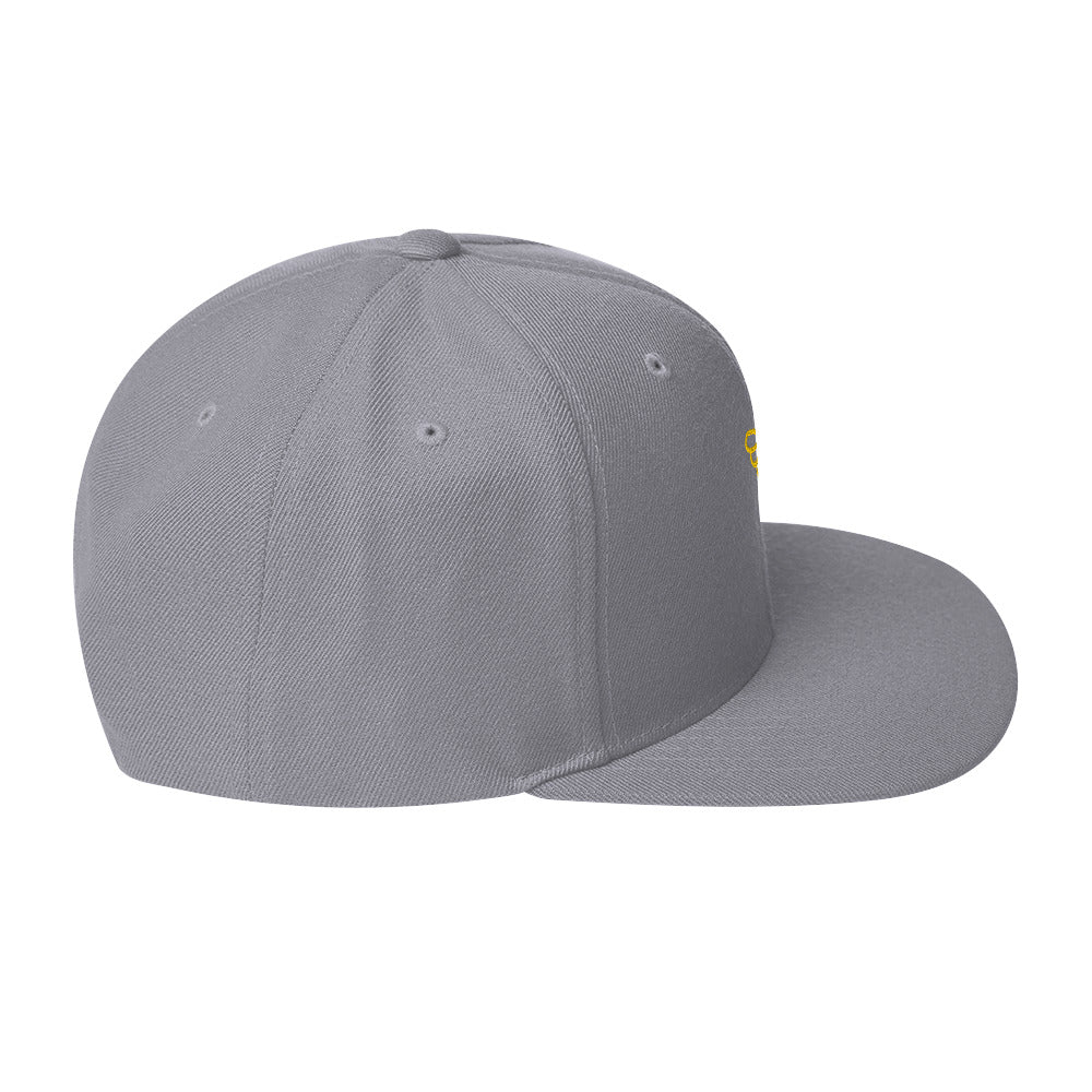 Gorra snapback Ave dorada